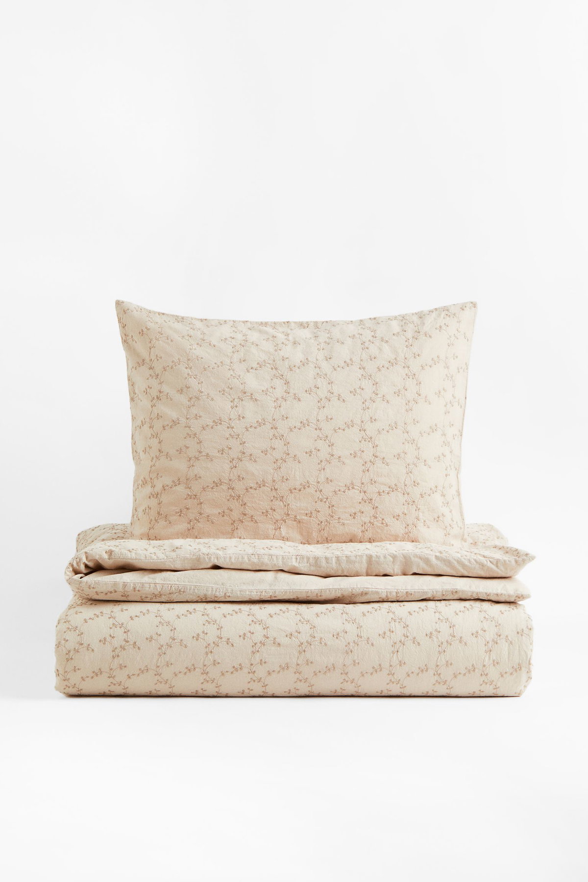 Gemütliche Baumwollbettwäsche von H&M Home, die für ein Einzelbett ideal ist.