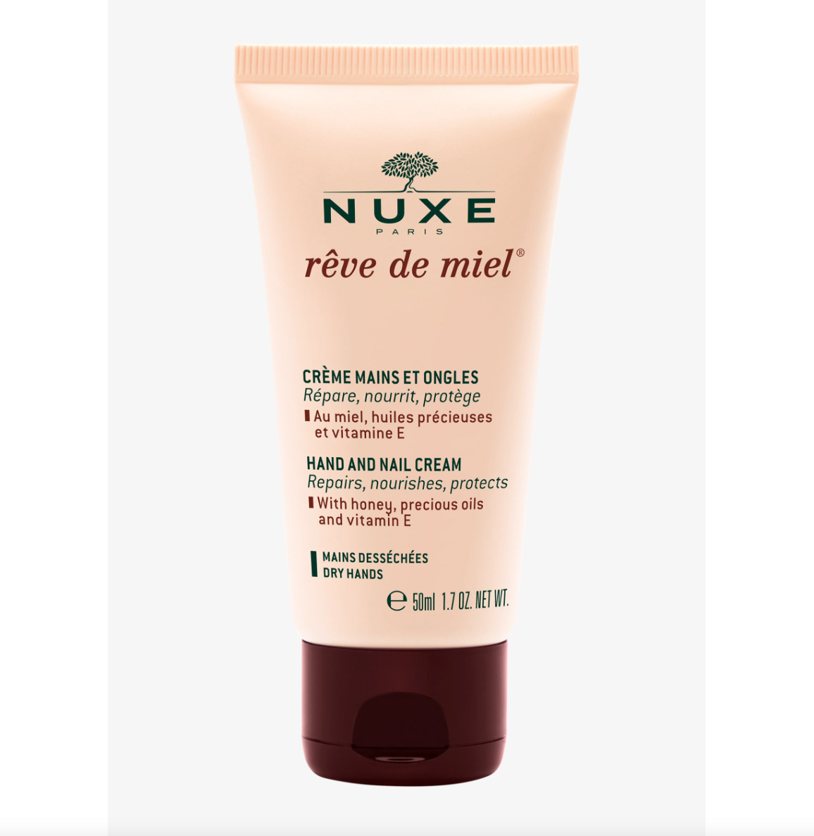 Die Hand- und Nagelcreme Rêve De Miel von Nuxe ist eine angenehme, nicht fettende Creme, die Honig und hochwertige Öle enthält. Sie spendet Feuchtigkeit und pflegt die Haut intensiv, während Vitamin E trockene und beanspruchte Hände regeneriert und vor frühzeitiger Hautalterung schützt.