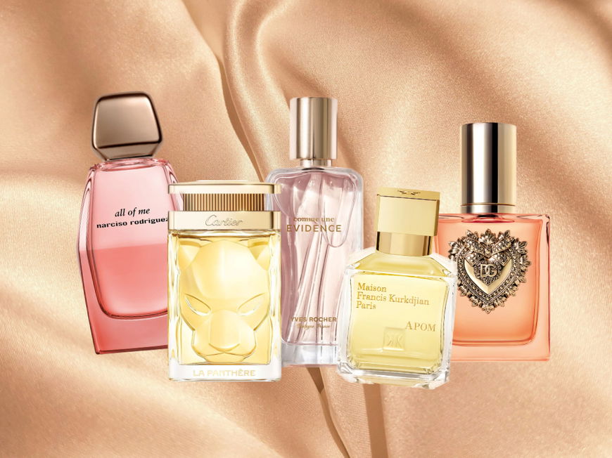 Verschiedene Parfums auf einem seidigen Hintergrund