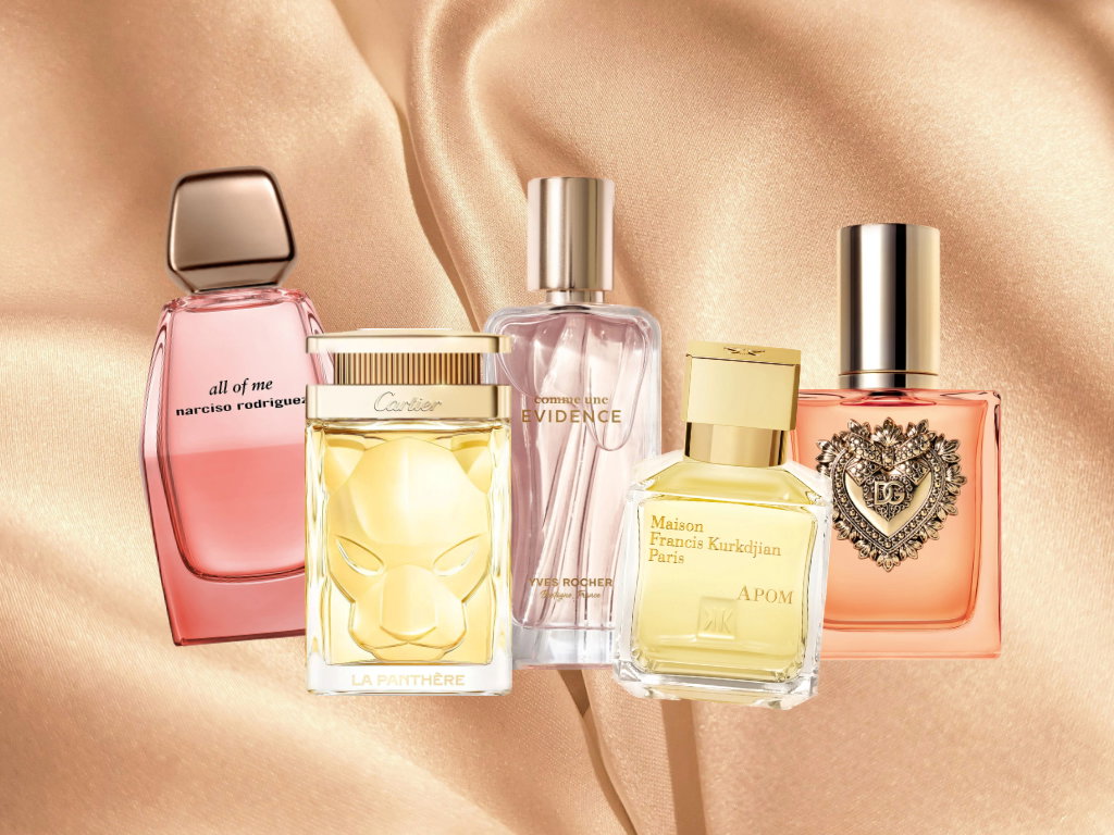 Verschiedene Parfums auf einem seidigen Hintergrund