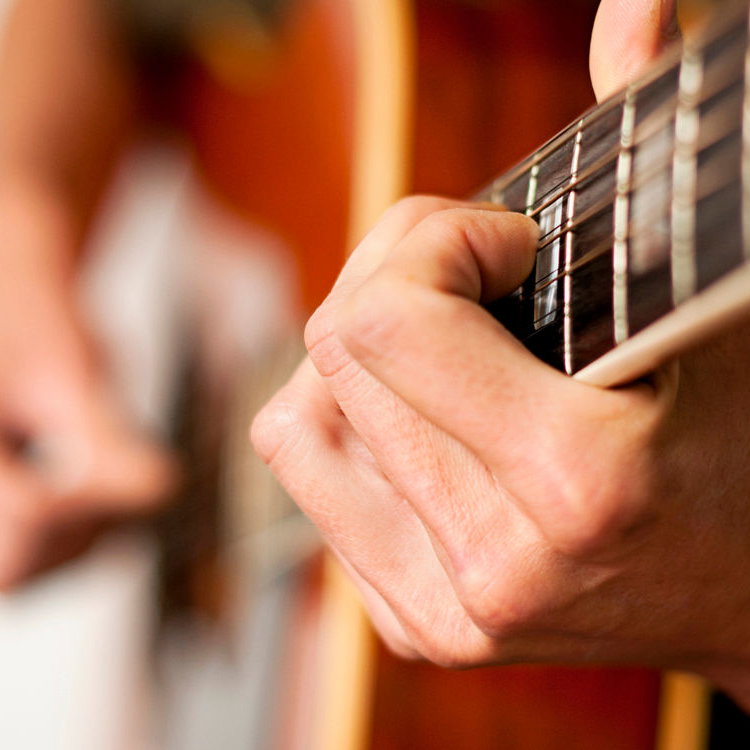 Mann Gitarre